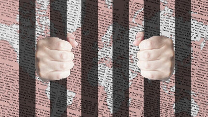 hands jail bars over world map with newspaper underlay