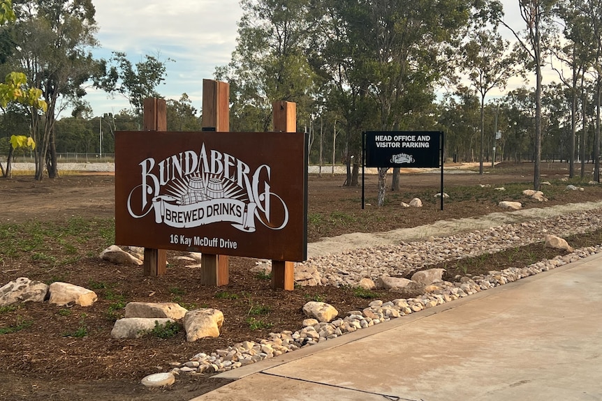 A wooden sign marks the entrance of the new Bundaberg Brewed Drinks premises