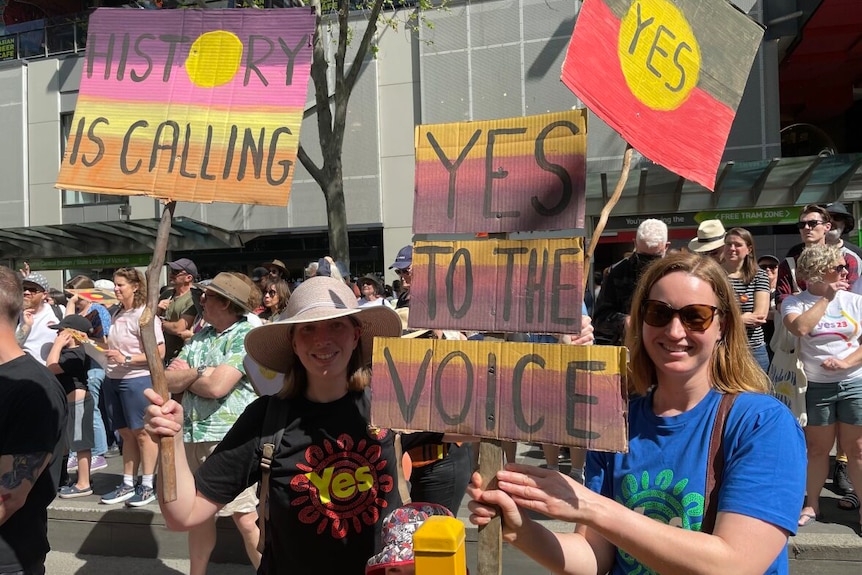 Melbourne Walk for Yes women stick posters