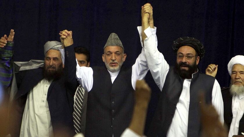 Hamid Karzai is widely tipped to be voted back into power, but his main challenger is gaining ground.