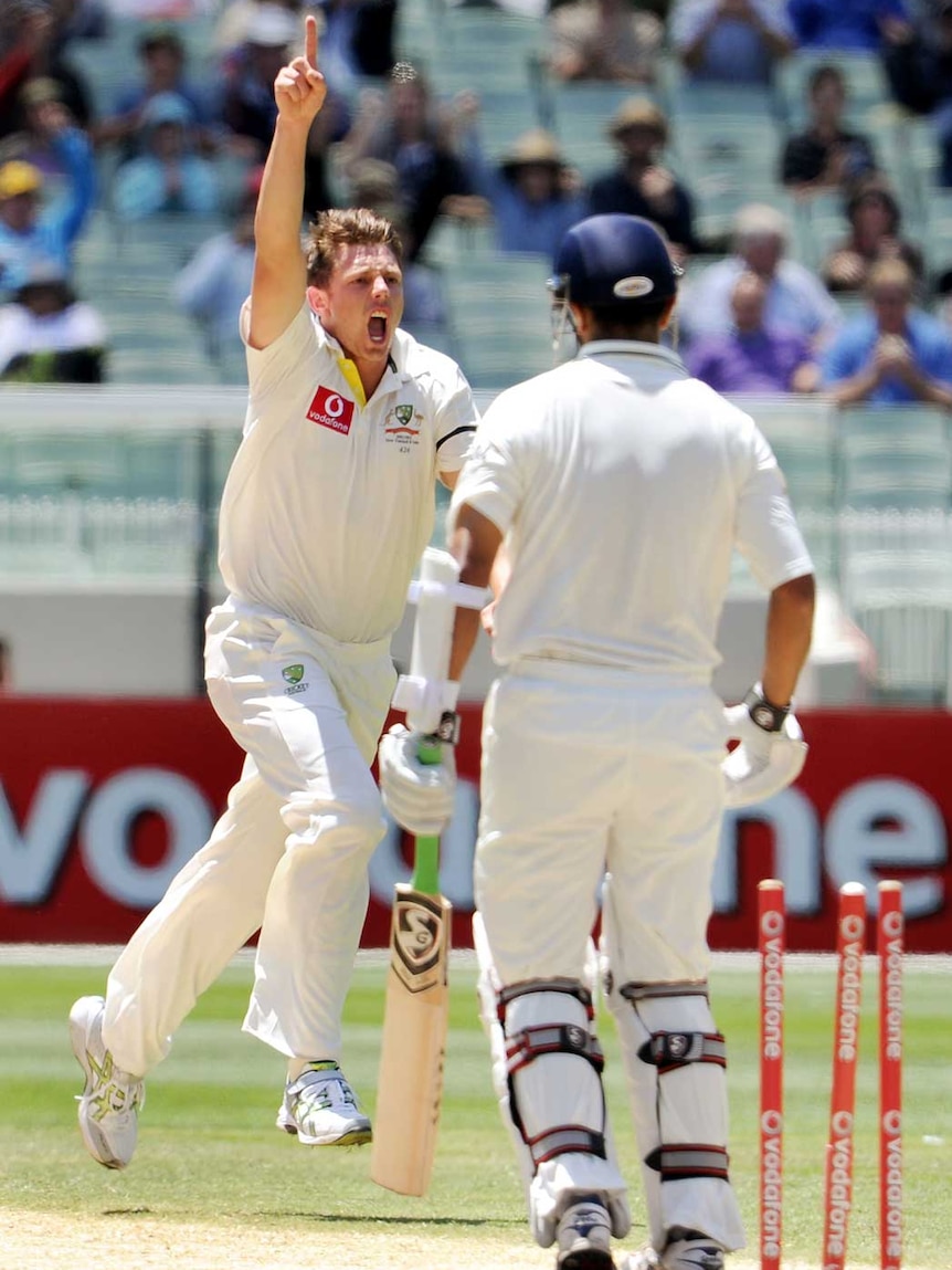 Star on the rise ... James Pattinson celebrates bowling Rahul Dravid during the MCG test (William West: AFP)