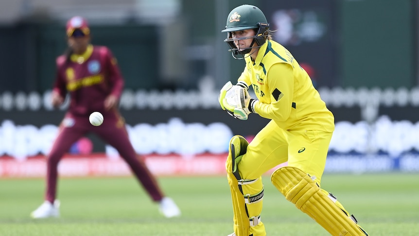 An Australian batter plays a cut shot during the Women's Cricket World Cup match against West Indies.