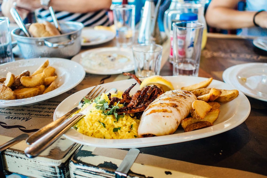 A plate of food in a restaurant.