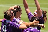 Kate Gill of the Glory is congratulated by team mates after scoring a goal during the W-League semi final match between Perth Glory and Sydney FC at Perth Oval