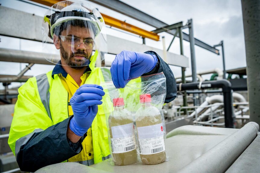 Aaron Duncan completing the first task: collection of the sewage