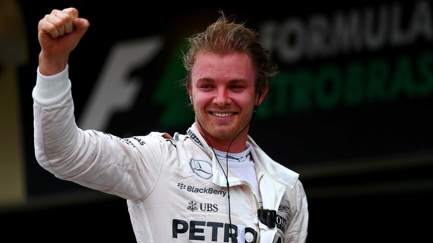 Mercedes driver Nico Rosberg celebrates his win in the Brazilian F1 Grand Prix on November 15, 2015.