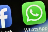 Whatsapp icon on a phone screen. 
