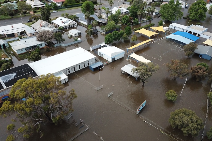 Flood waters cover buildings in a regional town