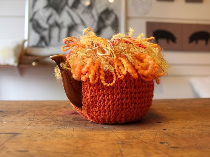 A fish inspired colourful tea cosy.
