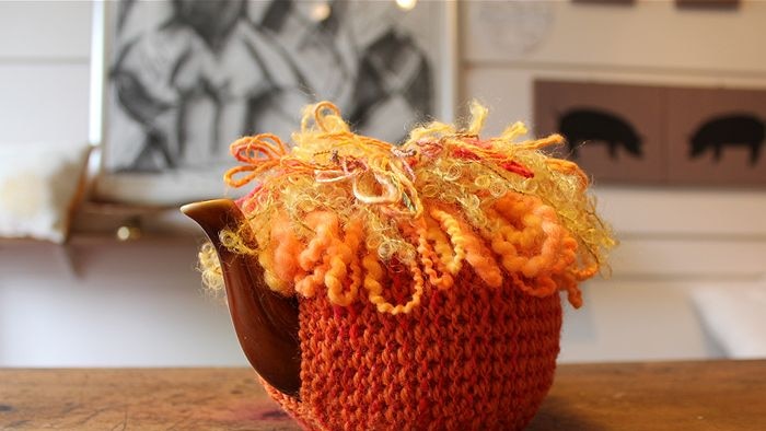 A fish inspired colourful tea cosy.