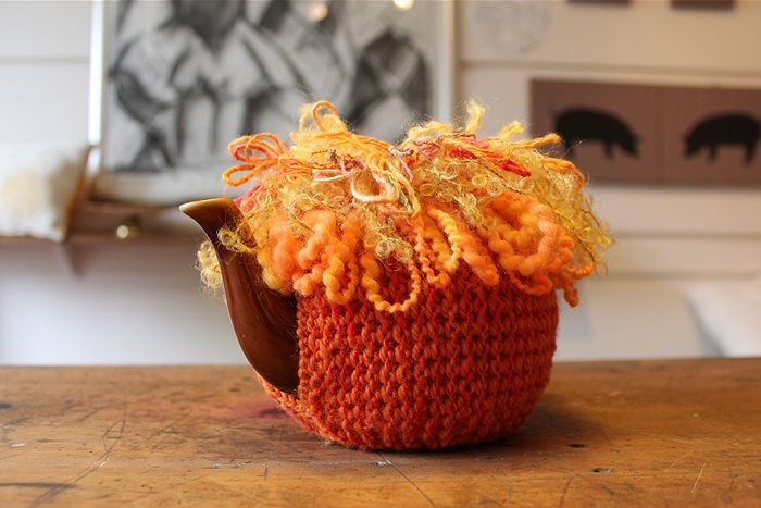 A fish inspired colourful tea cosy.