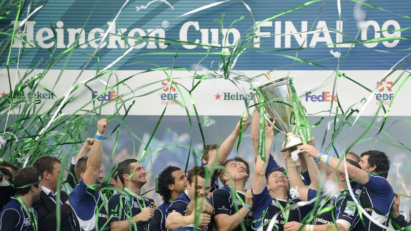 Brian O'Driscoll holds up the Heineken Cup with his Leinster team-mates.