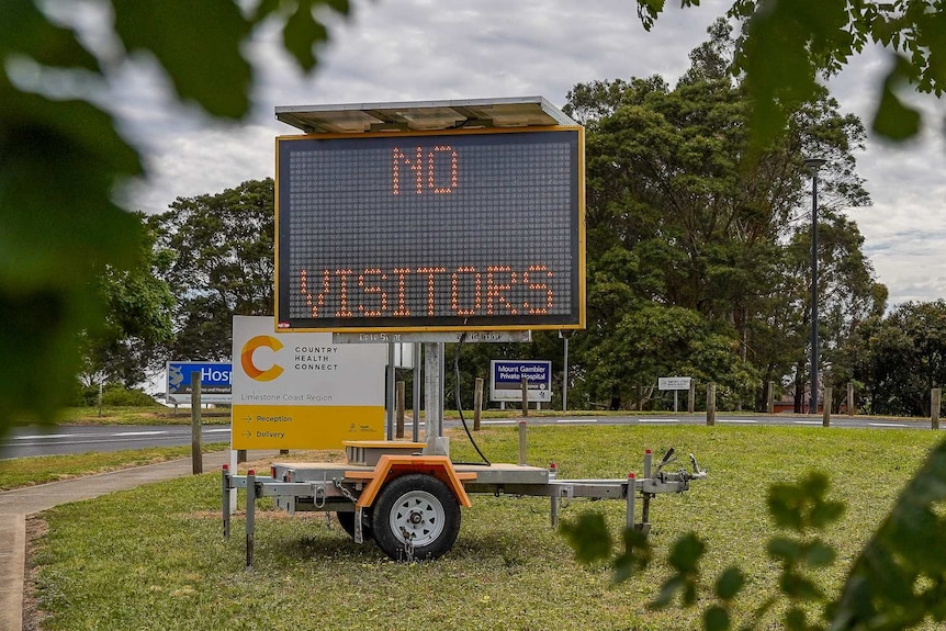 A sign outside Mount Gambier Hospital reads 'no visitors'.