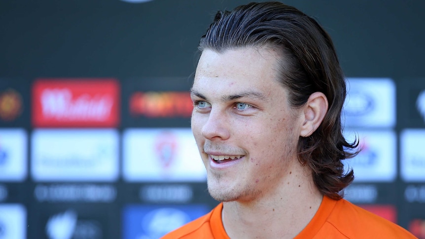 Brisbane Roar defender James Donachie speaks to the media at Roar training on April 20, 2016.