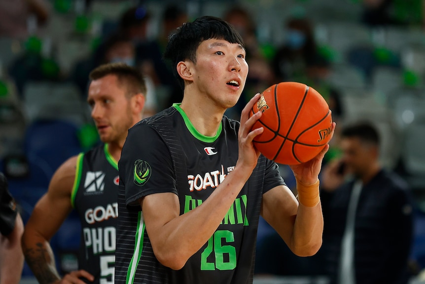 A basketball player about to take a free throw.