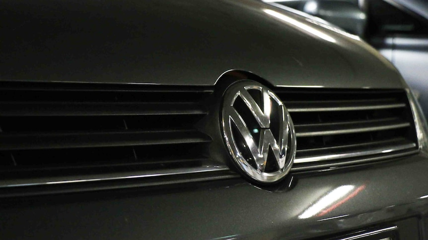 A close up of the VW logo on a Golf
