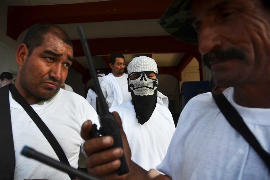 Armed vigilantes who are fighting Mexican drug cartel the Knights Templar