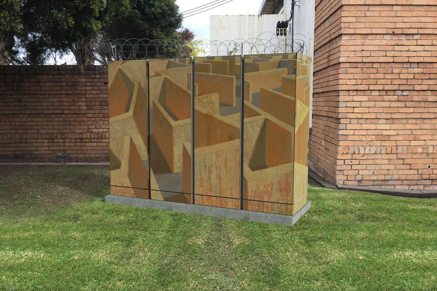 An artist's impression of a crate-size battery on grass by a brick wall