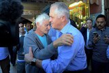 Malcolm Turnbull hugs Serge Oreshkin