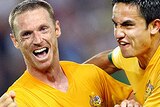Craig Moore celebrates with Tim Cahill after scoring against Croatia.