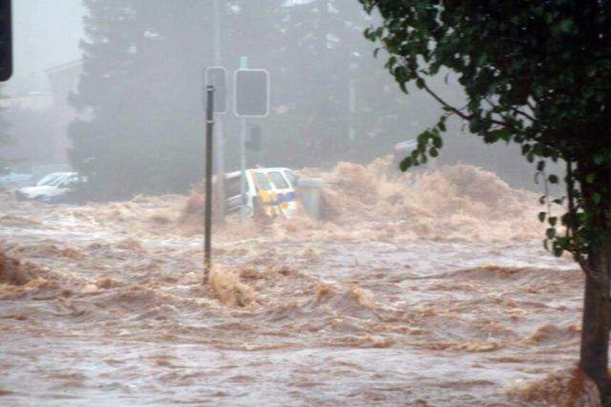 Car engulfed by floodwaters in Toowoomba