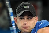 Defending champ Andy Roddick safely through to the third round. (File photo)