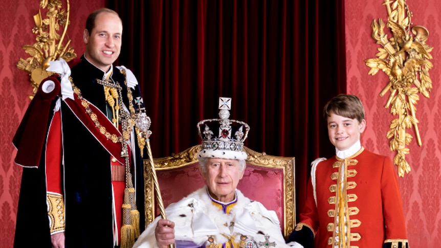 Prince William and Prince George stand either side of King Charles III as he sits on his throne at Buckingham Palace