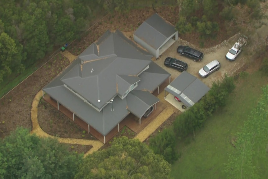 An aeriel image of Erin Patterson's home in Leongatha with four vehicles parked in the drive way