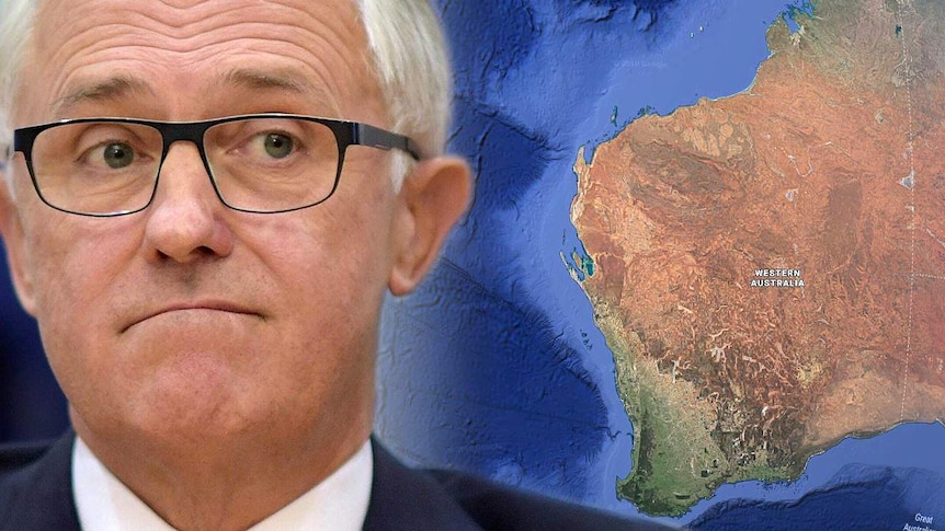 Malcolm Turnbull wearing glasses next to a map of WA.