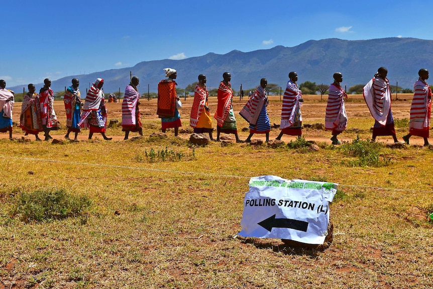 Maasai leave after voting in Ilngarooj.