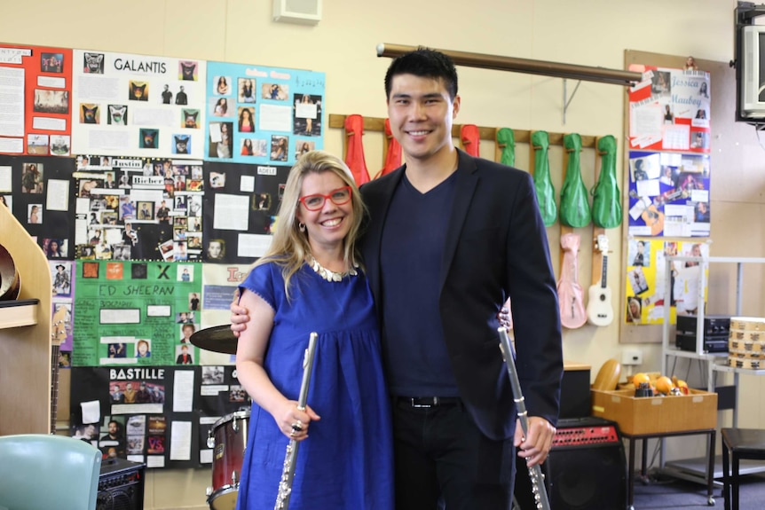 A music teacher and a student.