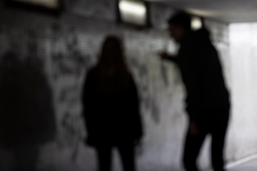 A man shouts at a woman.