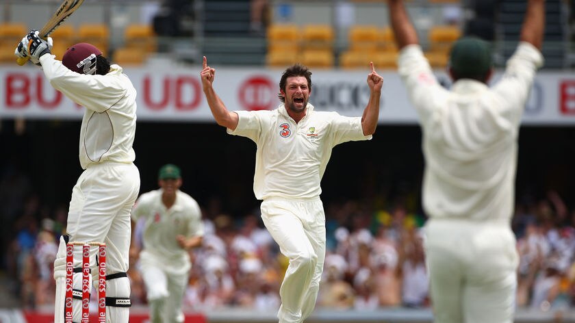 Ben Hilfenhaus celebrates the wicket of West Indies captain Chris Gayle.