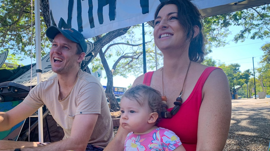 Allana Brown with her baby Hetty on her lap at the playgroup protest.