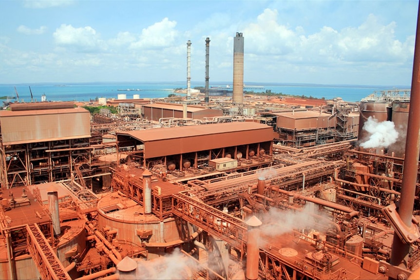 The bauxite refining facility on the Gove Peninsula, showing the power plant stacks.