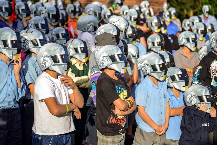 Wee Waa residents in Daft Punk helmets