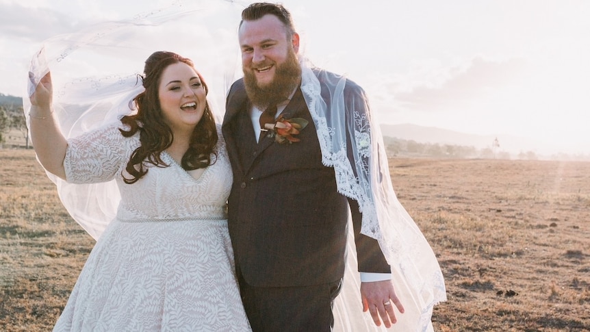 Caitlyn Lengkeek and her husband on their wedding day