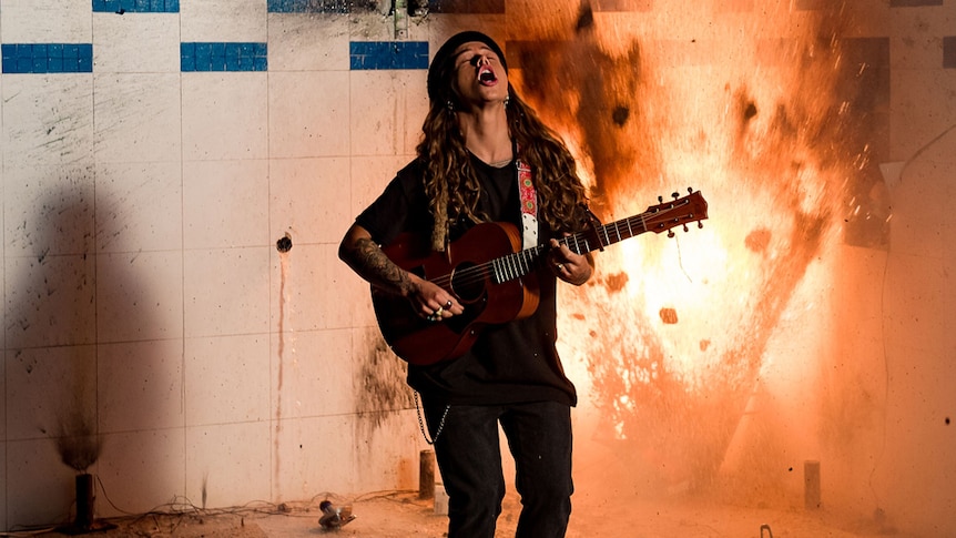 A still from Tash Sultana's 2019 music video for 'Can't Buy Happiness'