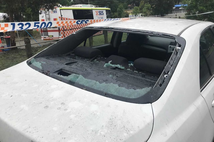 A car window smashed by hail