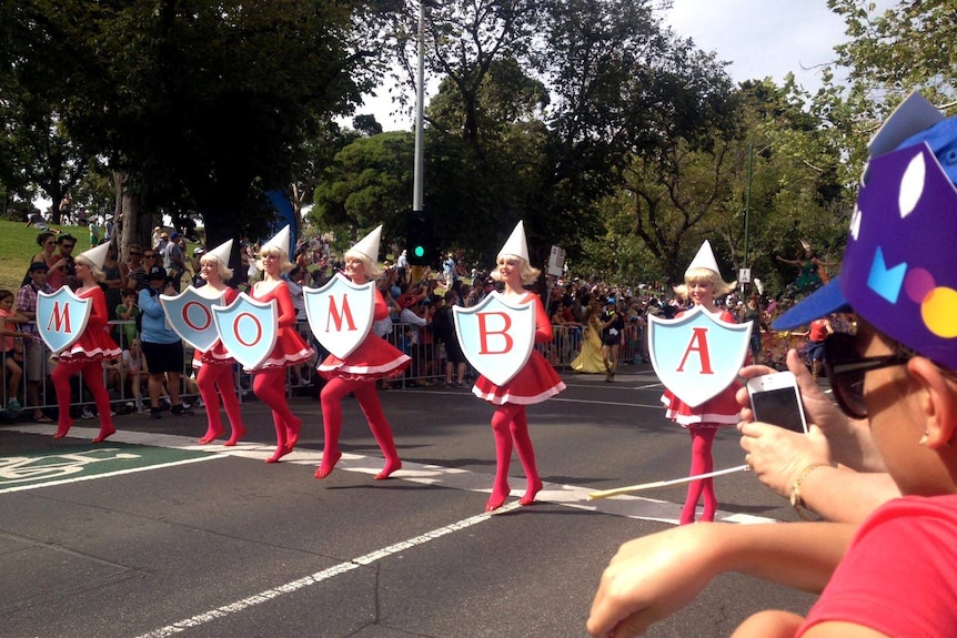 Spectators watch the Moomba Parade in Melbourne.