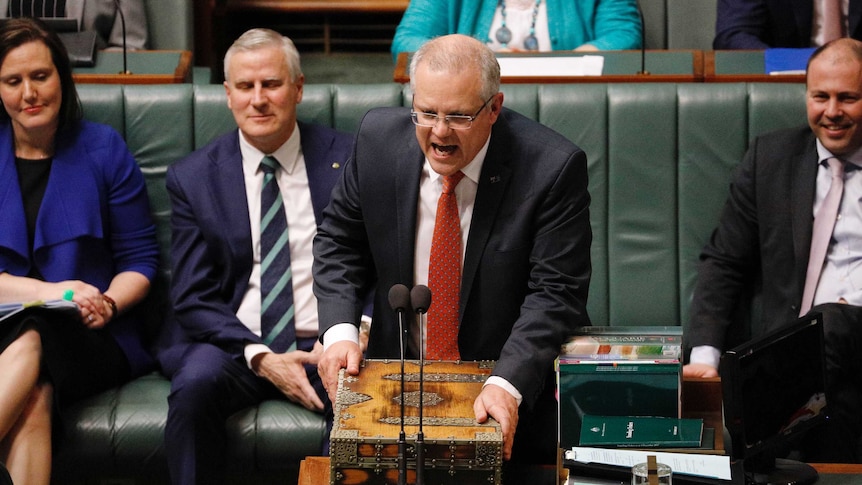 PM Scott Morrison yelling at the opposition from the despatch box in Question Time