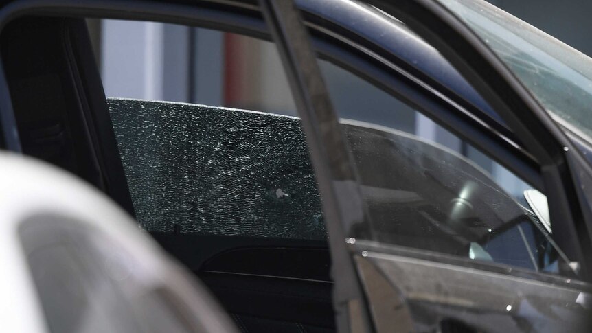 Bullet hole in passenger window
