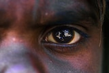 Extreme close up of Indigenous child's eye.
