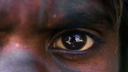 Extreme close up of Indigenous child's eye.