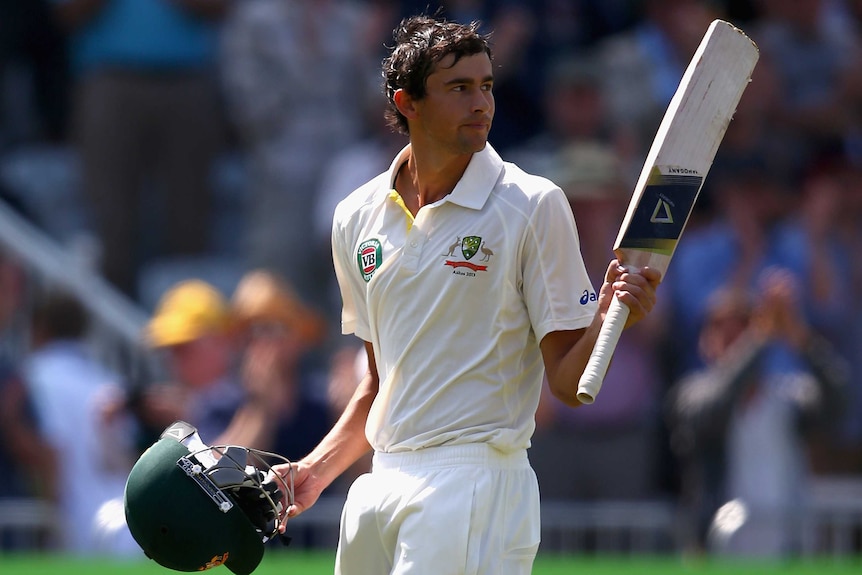 Agar raises his bat as he walks off at Trent Bridge