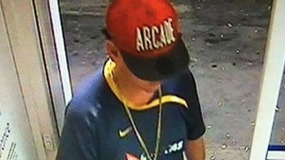 Captured by CCTV footage, police say this man with the cap on is Enoch Walsh at a Merredin petrol station