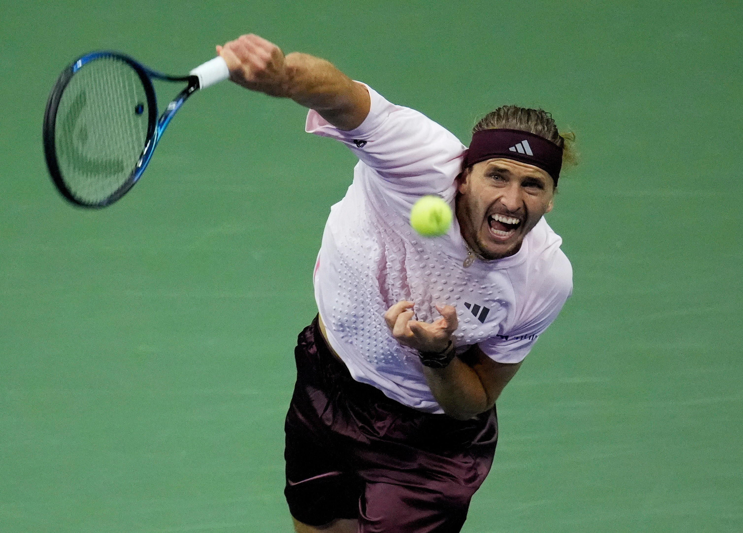 Alexander Zverev serves during a US Open match