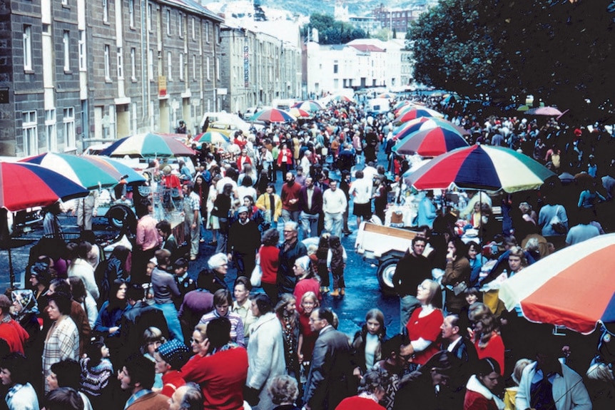 Coloured umbrellas and crowds at Salamanca Market, Hobart.