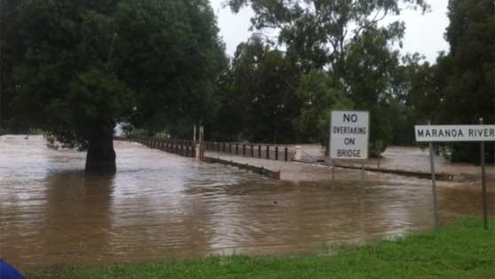 Residents in Mitchell say they have never seen the Maranoa River over the bridge before.