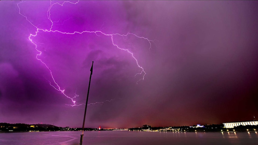 Lightning strike from the shores of Canberra's Lake Burley Griffin